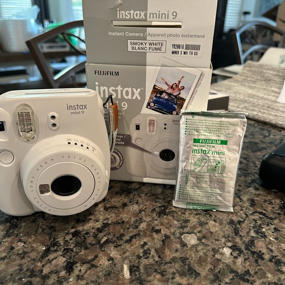 Fujifilm Other - Brand new opened but never used insta mini 9 camera with one pack of film